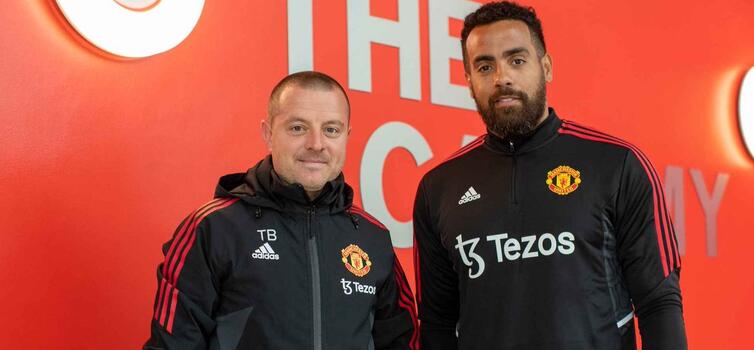 Huddlestone with United's Head of Player Development and Coaching Travis Binnion