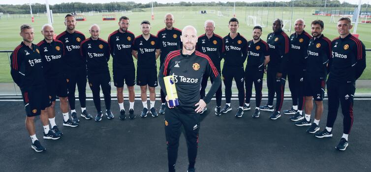 Erik ten Hag poses with the Manager of the Month Award in front of his backroom staff. Find out who they are below. 