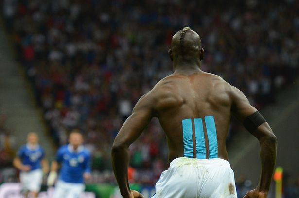 Balotelli sports a three stripe design on his back