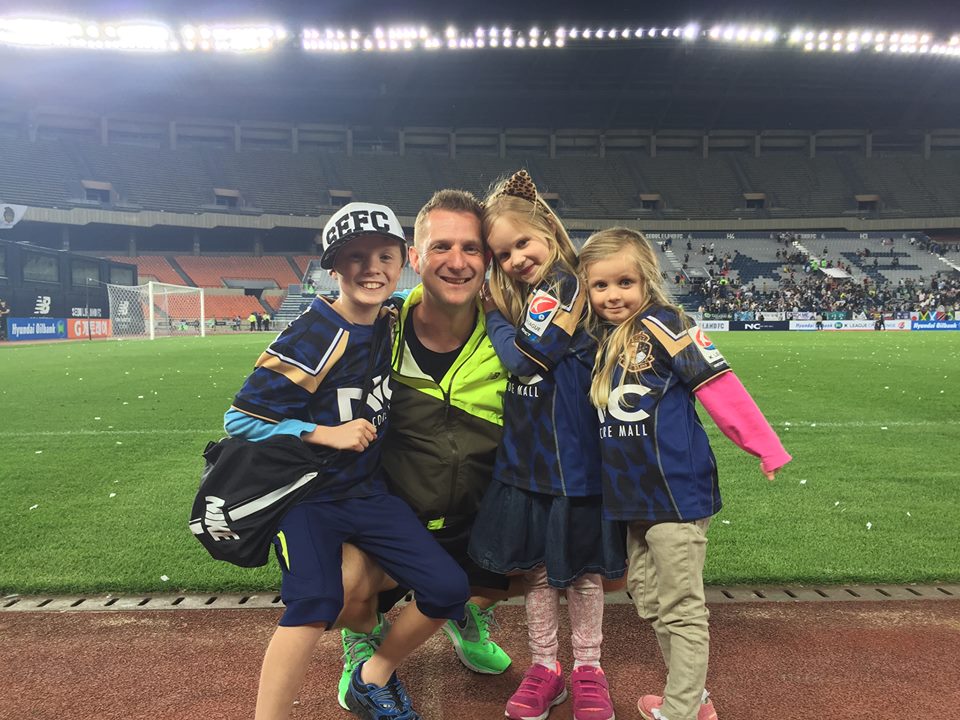 Harris on the pitch with his family last season