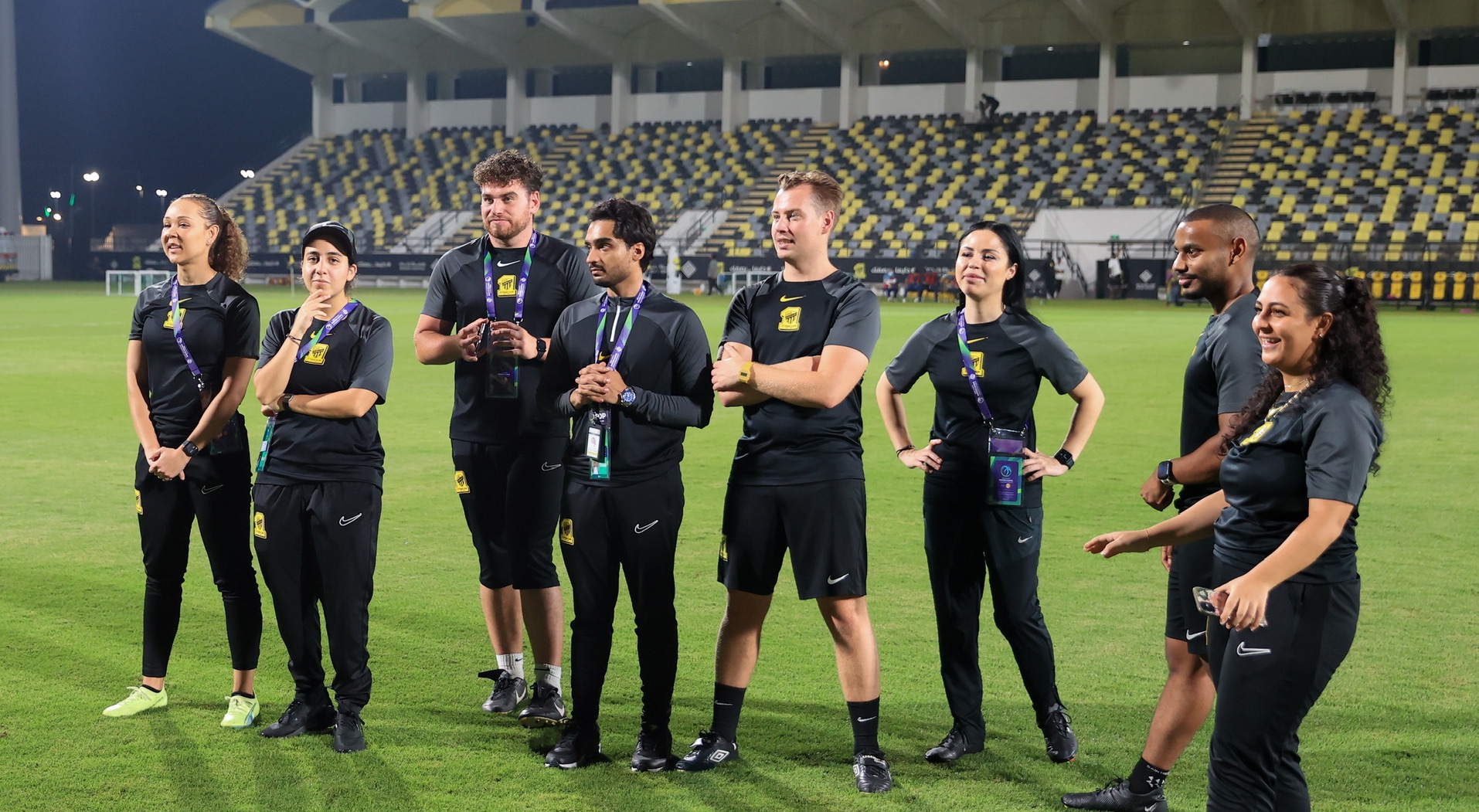 Smith (centre) with other members of the Al Ittihad Women's backroom staff